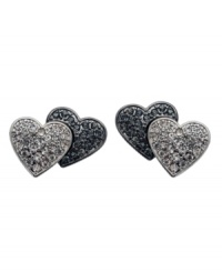 Double your love with these sweet earrings by GUESS. Each stud features one light imitation rhodium-plated heart with clear crystals and one dark hematite-plated heart with black crystals. Back of one stud engraved with script logo. Double your love with these sweet earrings by GUESS. Each stud features one light imitation rhodium-plated heart with clear crystals and one dark hematite-plated heart with black crystals. Back of one stud engraved with script logo.