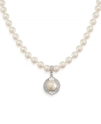 Classic cool. Carolee's necklace is crafted from silver-tone mixed metal with glass pearls figuring prominently, particularly on the pendant adorned with glistening glass stones. Approximate length: 17 inches. Approximate drop: 1/4 inch. Classic cool. Carolee's necklace is crafted from silver-tone mixed metal with glass pearls figuring prominently, particularly on the pendant adorned with glistening glass stones. Approximate length: 17 inches. Approximate drop: 1/4 inch.