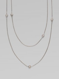 From the Petite Pavé Bead Collection. A long and graceful box-link chain of shining sterling silver, sprinkled with shimmering pavé diamond beads. Diamonds, 0.59 tcw Sterling silver Length, about 36 Lobster clasp Imported From the Petite Pavé Bead Collection. A long and graceful box-link chain of shining sterling silver, sprinkled with shimmering pavé diamond beads. Diamonds, 0.59 tcw Sterling silver Length, about 36 Lobster clasp Imported