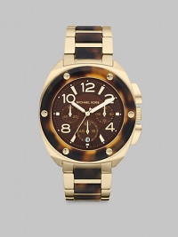 A goldtone finish over stainless steel and rich tortoise-look acetate accents combine in a stunning, full-function chronograph.Round goldtone-finished stainless steel case, 43mm (1.69)Quartz chronograph movementTortoise-look bezel with golden studsChocolate dial with chronograph sub dialsBold, golden bars and Arabic numeral hour markersSweep second handDate window at 6:00Goldtone bracelet with tortoise-look linksWater resistant to 10 ATMImported A goldtone finish over stainless steel and rich tortoise-look acetate accents combine in a stunning, full-function chronograph.Round goldtone-finished stainless steel case, 43mm (1.69)Quartz chronograph movementTortoise-look bezel with golden studsChocolate dial with chronograph sub dialsBold, golden bars and Arabic numeral hour markersSweep second handDate window at 6:00Goldtone bracelet with tortoise-look linksWater resistant to 10 ATMImported