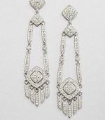 A long and elegant piece encrusted in pavé crystals. CrystalsRhodium-plated brassLength, about 2.5Post backImported 