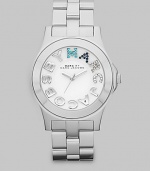 Colorful crystals accent the logo dial on this simply chic, stainless steel style. Quartz movementWater resistant to 5 ATMStainless steel case, 40mm (1.6) Smooth bezelWhite dialCrystal accented and smooth logo hour markersSecond hand Stainless steel link braceletImported 