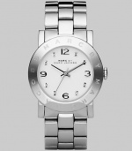 Stainless steel case and bracelet with a polished finish and clear stone hour markers.Quartz movement Water resistant to 3 ATM Stainless steel bezel with engraved logo Round case, 36mm, (1.43) White dial Numeral and clear stone hour makers Second hand Stainless steel bracelet, 20mm, (.79) Imported 