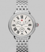 From the Serein Collection. Truly dazzle in this diamond accented technical timepiece. Quartz movementWater resistant to 5 ATMElliptical stainless steel case, 40mm (1.6) x 38mm (1.5) Diamond accented bezel, .6 tcwSilvertone dialRoman numeral hour markersDate display at 6 o'clockSecond hand Stainless steel link bracelet, 18mm (.7)Made in Switzerland 