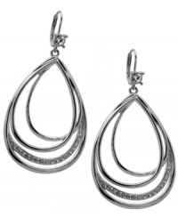 Chic curves. A perfect pear silhouette defines these distinctive drop earrings from T Tahari's Essentials Collection. Accented by sparkling clear crystals, they'll add glitter and glamour to your style for daytime or evening. Made in silver tone mixed metal and nickel-free for sensitive skin. Approximate drop: 2-1/2 inches. Chic curves. A perfect pear silhouette defines these distinctive drop earrings from T Tahari's Essentials Collection. Accented by sparkling clear crystals, they'll add glitter and glamour to your style for daytime or evening. Made in silver tone mixed metal and nickel-free for sensitive skin. Approximate drop: 2-1/2 inches.