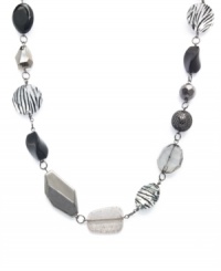 Show off your wild side in Style&co.'s long beaded necklace with zebra print designs. The black, white and gray palette makes it perfectly practical for coordinating with your wardrobe. Made in mixed metal. Approximate length: 40 inches. Show off your wild side in Style&co.'s long beaded necklace with zebra print designs. The black, white and gray palette makes it perfectly practical for coordinating with your wardrobe. Made in mixed metal. Approximate length: 40 inches.