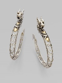 An intricately executed dragon of sterling silver and 18k gold makes an irreverently elegant statement.18k gold Sterling silver Diameter, about 1 Pierced Made in Bali An intricately executed dragon of sterling silver and 18k gold makes an irreverently elegant statement.18k gold Sterling silver Diameter, about 1 Pierced Made in Bali