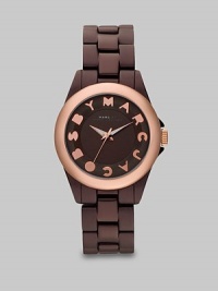 A ultra-lightweight design with a playful logo accented dial. Quartz movementWater resistant to 5 ATMRound brown aluminum case, 36mm (1.4)Smooth rose goldtone ion-plated bezelBrown dialLogo hour markersSecond hand Brown aluminum bracelet, 18mm wide (0.7)Imported