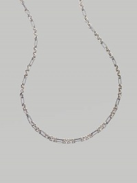 From the Silver Classics Collection. A stunning pattern of small, smooth loops and large oval cable links, all in sterling silver. Sterling silver Length, about 33 Toggle closure Made in USA From the Silver Classics Collection. A stunning pattern of small, smooth loops and large oval cable links, all in sterling silver. Sterling silver Length, about 33 Toggle closure Made in USA