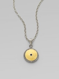 From the Shield Collection. An aptly named disc pendant of hammered 24k gold sits in a richly granulated frame of sterling silver with a faceted black spinel stone at its center.Black spinelSterling silver and 24k yellow goldAdjustable chain length, about 16-18Pendant diameter, about ¾Hook claspImported
