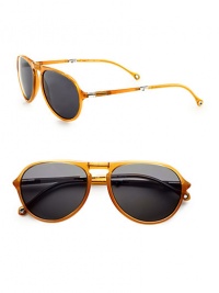 Handsomely crafted for everyday wear in lightweight resin for a polished finish. Available in shiny caramel frames with green lenses.Resin100% UV ProtectionMade in Italy Handsomely crafted for everyday wear in lightweight resin for a polished finish. Available in shiny caramel frames with green lenses.Resin100% UV ProtectionMade in Italy