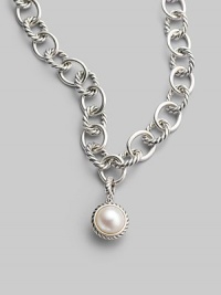 A lustrous white cultured pearl in a graceful cable frame makes an elegant addition to your own necklace or bracelet. White cultured pearl Sterling silver Diameter, about ½ Spring clip clasp Imported Please note: Necklace sold separately. A lustrous white cultured pearl in a graceful cable frame makes an elegant addition to your own necklace or bracelet. White cultured pearl Sterling silver Diameter, about ½ Spring clip clasp Imported Please note: Necklace sold separately.