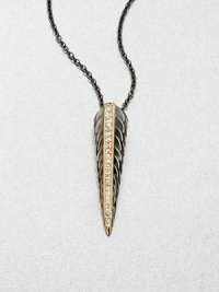 Sparkling white sapphires set in radiant 23k goldplating on a sterling silver feather base with a link chain. White sapphires23k goldplated sterling silverSterling silverLength, about 16 to 18 adjustablePendant size, about 1.44Lobster clasp closureImported