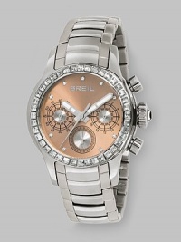From the Logo Collection. An elegant chronograph in stainless steel with a lustrous mother-of-pearl dial and sparkling Swarovski crystal bezel and hour markers. Quartz movement Water resistant to 10 ATM Round stainless steel case, 37mm diameter(1.46) Champagne mother-of-pearl dial Crystal hour markers Three chronograph sub dials Second hand Stainless steel link bracelet Imported From the Logo Collection. An elegant chronograph in stainless steel with a lustrous mother-of-pearl dial and sparkling Swarovski crystal bezel and hour markers. Quartz movement Water resistant to 10 ATM Round stainless steel case, 37mm diameter(1.46) Champagne mother-of-pearl dial Crystal hour markers Three chronograph sub dials Second hand Stainless steel link bracelet Imported