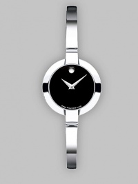Slim and sleek stainless style is accented with a black museum dial. Quartz movement Round face 24mm Stainless steel band Made in Switzerland Slim and sleek stainless style is accented with a black museum dial. Quartz movement Round face 24mm Stainless steel band Made in Switzerland