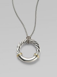 From the Metro Collection. A sleek, sophisticated circle, combining smooth and cabled sterling silver with accents of 18k gold, hangs from a richly textured silver chain and bale. Sterling silver and 18k yellow gold Chain length, about 18 Pendant diameter, about 1¼ Spring ring clasp Imported