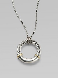 From the Metro Collection. A sleek, sophisticated circle, combining smooth and cabled sterling silver with accents of 18k gold, hangs from a richly textured silver chain and bale. Sterling silver and 18k yellow gold Chain length, about 18 Pendant diameter, about 1¼ Spring ring clasp Imported From the Metro Collection. A sleek, sophisticated circle, combining smooth and cabled sterling silver with accents of 18k gold, hangs from a richly textured silver chain and bale. Sterling silver and 18k yellow gold Chain length, about 18 Pendant diameter, about 1¼ Spring ring clasp Imported
