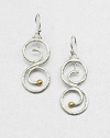 A hammered sterling silver swirl design accented with radiant 24k gold. Sterling silver24k goldDrop, about 1.5Hook backImported 