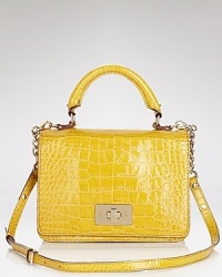 A sleek, chic take on the satchel, kate spade new york crafts this carryall from eye-catching embossed patent leather and finishes the look with bold hardware. A sleek, chic take on the satchel, kate spade new york crafts this carryall from eye-catching embossed patent leather and finishes the look with bold hardware.