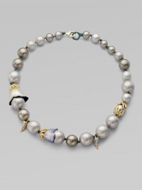 From the Lucite Collection. An elegant piece with hand-crafted floral lucite embellishments and Swarovski crystal accents. Pearlized shell beadsSwarovski crystalsGoldtoneHand-crafted luciteLength, about 1618k gold lobster clasp closureMade in USA