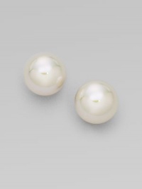 Classic white pearl studs are eternally chic. 14mm organic man-made pearls 18k goldplated sterling silver Post back Made in Spain