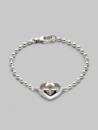 From the Love Britt Collection. Signature interlocking G in an iconic heart shape accents the wrist beautifully. Sterling silver Width of heart, about ¾ Length, about 6½ Lobster clasp closure Made in Italy From the Love Britt Collection. Signature interlocking G in an iconic heart shape accents the wrist beautifully. Sterling silver Width of heart, about ¾ Length, about 6½ Lobster clasp closure Made in Italy