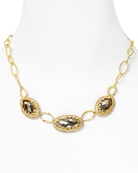 Revel in Alexis Bittar's cool elegance with this triple link necklace crafted from glistening gold plate. It rocks both a simplicity as well as a glam factor with faceted Swarovski crystals. Revel in Alexis Bittar's cool elegance with this triple link necklace crafted from glistening gold plate. It rocks both a simplicity as well as a glam factor with faceted Swarovski crystals.