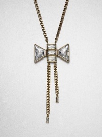 Faceted rhinestones add interest to this sweet bow style on a link chain. Glass stonesBrassLength, about 25.9Pendant size, about 3.5Spring ring closureImported 