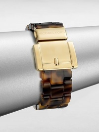 A watch-inspired, tortoise-pattern acetate link design with a radiant goldtone buckle closure. Tortoise-pattern acetateGoldtone steelDiameter, about 2.25Fold-over buckle closureImported A watch-inspired, tortoise-pattern acetate link design with a radiant goldtone buckle closure. Tortoise-pattern acetateGoldtone steelDiameter, about 2.25Fold-over buckle closureImported