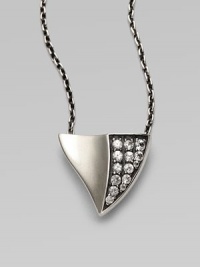 From the Thorn Collection. A graceful yet bold thorn-shaped pendant of gleaming sterling silver, with a concave profile on one side and sparkling white sapphires on the other, on an oxidized silver chain.White sapphireSterling silverChain length, about 16-18 (adjustable)Pendant length, about ¾Lobster claspImported From the Thorn Collection. A graceful yet bold thorn-shaped pendant of gleaming sterling silver, with a concave profile on one side and sparkling white sapphires on the other, on an oxidized silver chain.White sapphireSterling silverChain length, about 16-18 (adjustable)Pendant length, about ¾Lobster claspImported
