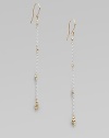 Gracefully dangling strands of sterling silver chain, sprinkled and tipped with glowing faceted beads of 14k gold.14k yellow gold and sterling silverLength, about 2¼Ear wireMade in USA