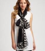 Dynamic roses and leaves crafted in a striking zebra print breathe life into a luxurious silk scarf.SilkAbout 28 X 110Dry cleanMade in Italy