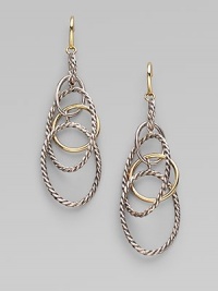 A coming together of the cabled and the smooth, the oval and the circle, sterling silver and 18k gold, in a delicate linked design that dangles with mobile grace. 18k yellow gold and sterling silver Drop, about 2½ Ear wire Made in Italy