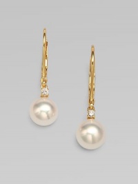 A lustrous piece with Akoya pearls accented with brilliant diamonds set in 18k gold. 7mm white, round, Akoya pearlsDiamonds, .06 tcw18k goldDrop, 1Lever backImported A lustrous piece with Akoya pearls accented with brilliant diamonds set in 18k gold. 7mm white, round, Akoya pearlsDiamonds, .06 tcw18k goldDrop, 1Lever backImported