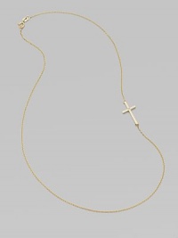 A wispy chain of 14k yellow gold features a cross pendant, punctuated by a single sparkling diamond, set askew for a modern edge.Diamond, .02 tcw 14k yellow gold Length, about 16 Pendant length, about ¾ Spring ring clasp Made in USA