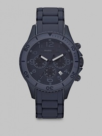 A signature design with timeless elements, set in stainless steel with tonal textures, a three-eye chronograph function and date display, stylishly finished with a smooth, silicone wrap bracelet.Chronograph movementRound bezelWater resistant to 5ATMDate display at 5 o'clock Second handStainless steel case: 46mm(1.81)Silicone wrap braceletImported A signature design with timeless elements, set in stainless steel with tonal textures, a three-eye chronograph function and date display, stylishly finished with a smooth, silicone wrap bracelet.Chronograph movementRound bezelWater resistant to 5ATMDate display at 5 o'clock Second handStainless steel case: 46mm(1.81)Silicone wrap braceletImported