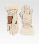 Keep your hands extra warm in this stylish nylon design with plush shearling cuff and easy-grip deerskin palm. Dyed sheepskin shearlingCinched wristAbout 10½ longPolyester; dry cleanImportedFur origin: Spain