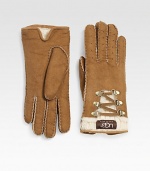 A tactile style with contrast knit trim and pretty lace up details. Dyed sheepskin shearlingAbout 9 longTrim: 80% wool/20% nylonSpecialist dry cleanImportedFur origin: Spain