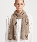 EXCLUSIVELY AT SAKS.COM. An ultra-soft, ultra-plush wool blend knit wrap is given a feminine update with crystal embellishment.40% polyester/28% nylon/17% wool/10% angora/5% cashmereAbout 10 X 64Dry cleanImported