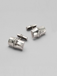 An artful interpretation of bamboo, created in sterling silver. Chunky cuff links with etched detailing Made in Bali An artful interpretation of bamboo, created in sterling silver. Chunky cuff links with etched detailing Made in Bali