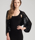 Sequin crochet in an easy-fitting tube shape fits over the shoulders for a glamorous evening look. Rayon; dry clean One size fits most Imported