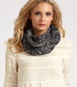 Slither into chic style in a fine gauzy design with baby fringe and logo embroidery. WoolAbout 45½ X 69½Dry cleanImported