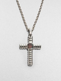 This classic, sterling silver cross pendant is adorned with labradorite, lending a touch of modern elegance.Sterling silverLabradoriteAbout 20 long; Pendant: about 1 x 1½ diam.Imported