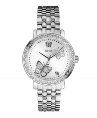 Swarovski crystals accent the bezel of this elegant GUESS timepiece and lend it luxurious sensibility. Swarovski crystals accent the bezel of this elegant GUESS timepiece and lend it luxurious sensibility.