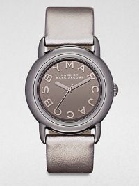 A sleek gunmetal ion-plated stainless steel design with a metallic leather strap. Quartz movementWater resistant to 5 ATMRound gunmetal ion-plated stainless steel case, 33mm (1.3)Smooth bezelGunmetal mirror dialLogo hour markersSecond hand Metallic leather strapImported A sleek gunmetal ion-plated stainless steel design with a metallic leather strap. Quartz movementWater resistant to 5 ATMRound gunmetal ion-plated stainless steel case, 33mm (1.3)Smooth bezelGunmetal mirror dialLogo hour markersSecond hand Metallic leather strapImported