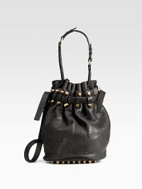 Bold studs and rugged pebble leather join forces in a drawstring bucket bag with lots of attitude. Adjustable leather shoulder strap, 17-21 dropDrawstring closureOne outside open pocketProtective metal feetOne inside zip pocketFully linedLeather14½W X 12H X 8DImported Bold studs and rugged pebble leather join forces in a drawstring bucket bag with lots of attitude. Adjustable leather shoulder strap, 17-21 dropDrawstring closureOne outside open pocketProtective metal feetOne inside zip pocketFully linedLeather14½W X 12H X 8DImported