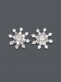 Blindingly beautiful. 14k white gold snowflake-shaped studs shimmer with round-cut diamond (1/4 ct. t.w.). Approximate diameter: 3/4 inch. Blindingly beautiful. 14k white gold snowflake-shaped studs shimmer with round-cut diamond (1/4 ct. t.w.). Approximate diameter: 3/4 inch.