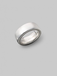 A classic sterling silver ring, with cable detail on the sides. About ½ wide Imported A classic sterling silver ring, with cable detail on the sides. About ½ wide Imported