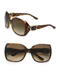 Chic tortoiseshell frames, accented with goldtone logo details. Available in havana frames with brown gradient lens. GG logo temples100% UV protectionMade in Italy Chic tortoiseshell frames, accented with goldtone logo details. Available in havana frames with brown gradient lens. GG logo temples100% UV protectionMade in Italy