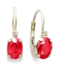 Sparkling perfection. Add a vibrant pop of color to your look with oval-cut ruby (9/10 ct. t.w.) and sparkling diamond accents. Crafted in a 14k gold leverback setting. Approximate drop: 3/4 inch. Sparkling perfection. Add a vibrant pop of color to your look with oval-cut ruby (9/10 ct. t.w.) and sparkling diamond accents. Crafted in a 14k gold leverback setting. Approximate drop: 3/4 inch.